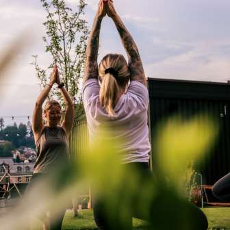 Yoga in the garden of STORY Thusis