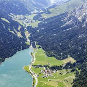 Aerial view of Sufers with Splügen in the background