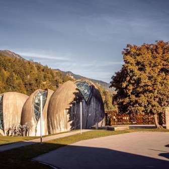 The stone church in Cazis in the fall