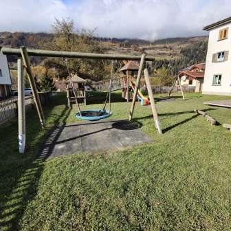 Swing in the kindergarten / Scoleta Zillis playground