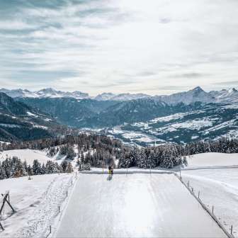 View from the natural ice field Alp Raguta