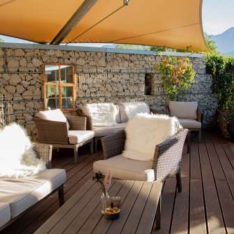 The terrace with lounge at the Triangel restaurant in Paspels