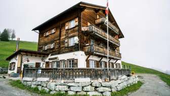 The Gasthaus Post in Obermutten in summer