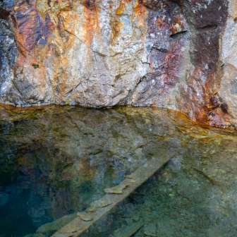 Discolored rock in the disused silver mines on the Alp Taspegn