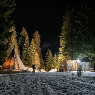 The tipi and toboggan bar on the Schamserberg in the evening
