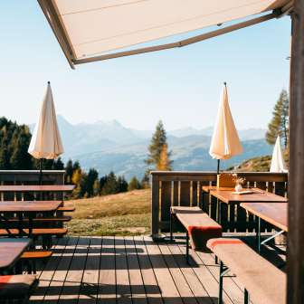 The terrace of the Feldis ski hut in summer