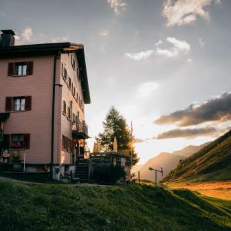 The Beverin mountain inn on the Glas Pass at sunrise