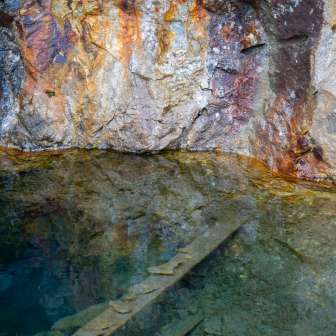Discolored rock in the disused silver mines on the Alp Taspegn