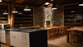 The open kitchen creates an inviting atmosphere