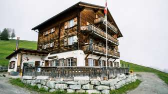 The Gasthaus Post in Obermutten in summer The Gasthaus Post in Obermutten in summer