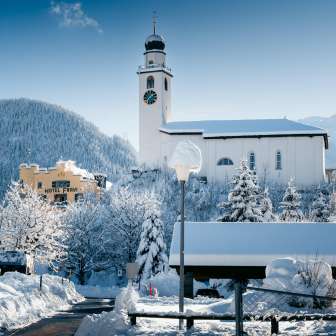 The Hotel Fravi and Andeer church in winter