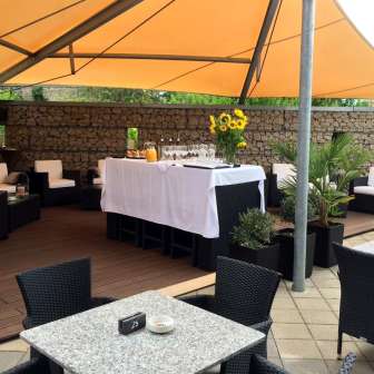The terrace with lounge at the Triangel restaurant in Paspels
