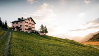 The Beverin mountain inn on the Glas Pass at sunrise