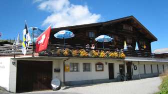 The Obergmeind mountain lodge in winter