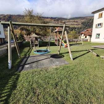 Swing in the kindergarten / Scoleta Zillis playground