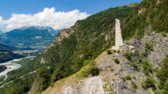 The Hochjuvalt ruins with the Rhine meadows and Rhäzüns in the background